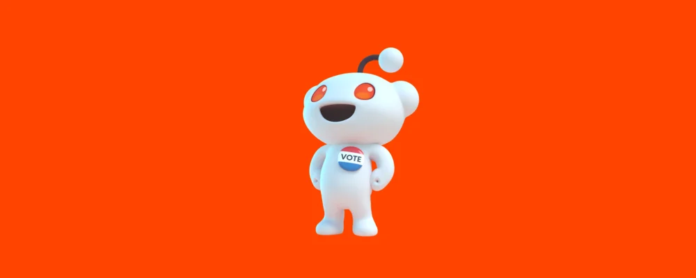 Una caricatura blanca con un botón de "VOTE" en su pecho, con un fondo naranja.